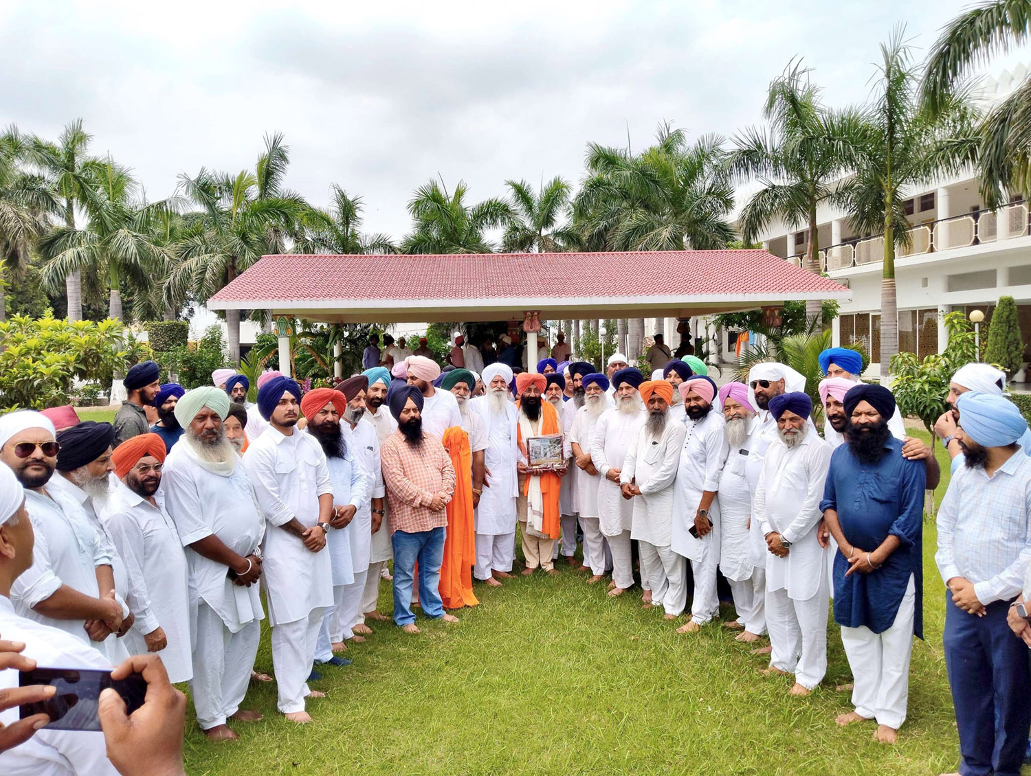 Lali Bajwa along with his companions paid obeisance at Gurdwara Santgarh Harkhowal.